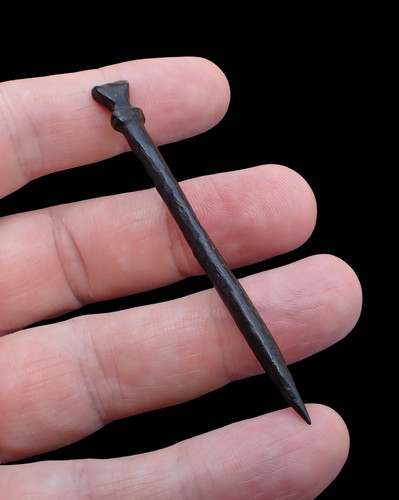 Medieval wooden stylus - a,
