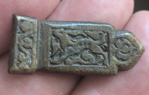 Roman bronze strap end - end, with