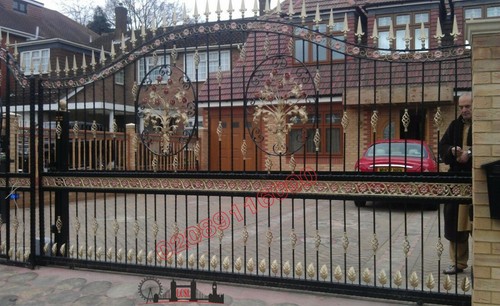New wrought iron driveway - wrought,