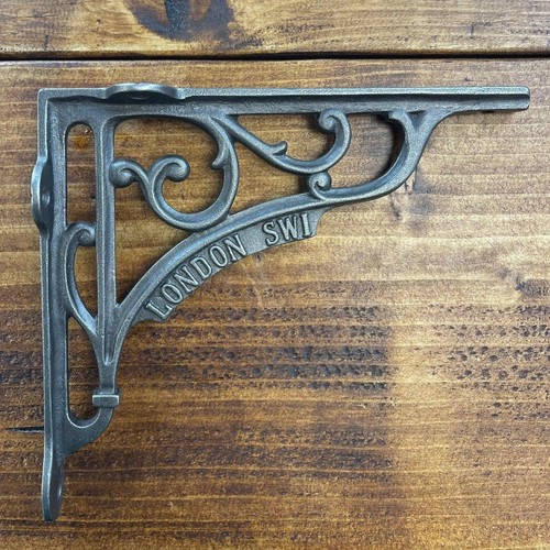 Cast iron shelf brackets - cast,