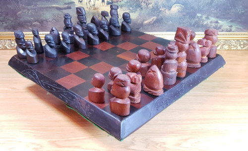 Hand carved wooden chess set - hand,