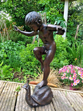 Bronze Boy on Snail Garden Water Feature of a Boy on a Snail Bronze statue