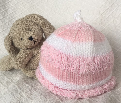 Hand knitted baby girls - hand,