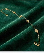 SOLID 18CT GOLD CHARM BRACELET