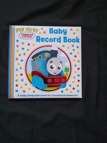 First baby record book - book,