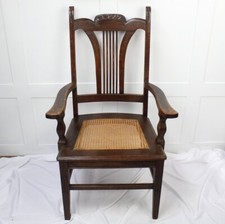 Victorian Oak Throne Chair with Cane Seat. Displays a Desirable Aged Patina.