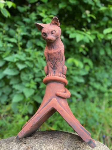 Curious cat roof finial - cat,