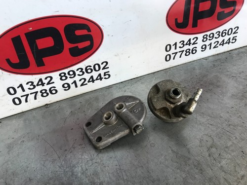 Pair oil filter heads for