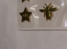 Dior Star and Bee Pin - Brand New and Sealed - Authentic - Size 1cmx1cm 