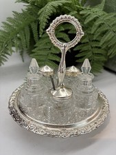 Beautiful vintage rotating cut glass Cruet Set With stand. 5 piece set. VGC.