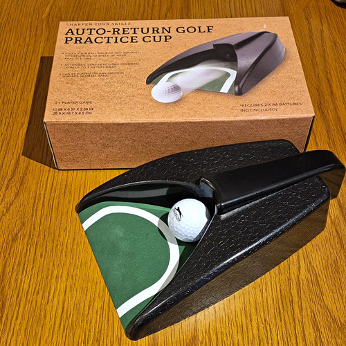 Auto return putting cup - auto-return,