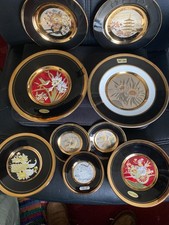 9 Chokin plates in Superb condition with 24 carat gold painted rims.