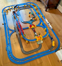Tomy Tomica Super Deluxe train and road set with trains and vehicles all working