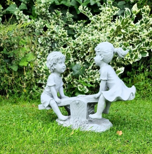 Garden ornaments boy and - boy,