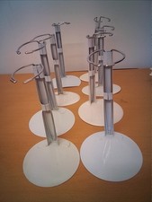 Adjustable White Metal Doll