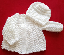 Brand new hand knitted matinee