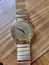 Gucci ladies gold watch