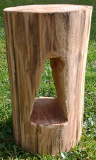 Log with triangle sculpture