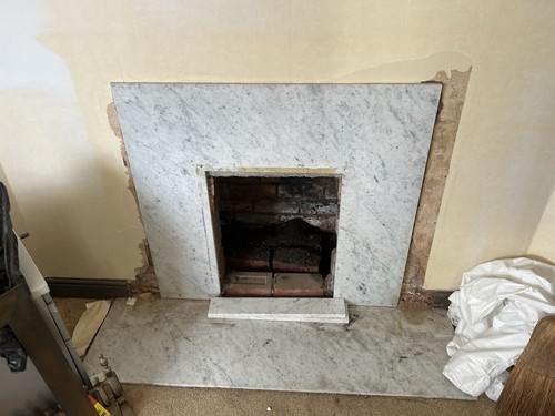 Marble fireplace surround and - surround,