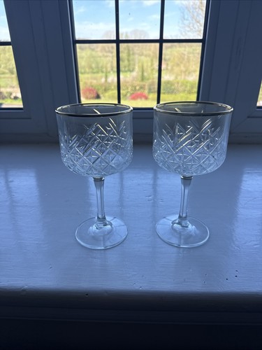 Cut glass wine goblets with - cut,