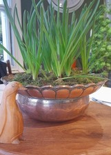 A vintage copper planter