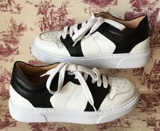 Russell & Bromley White &