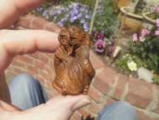 1a.  Hand Carved wood netsuke Dragon wrapped around pearl boxwood figure