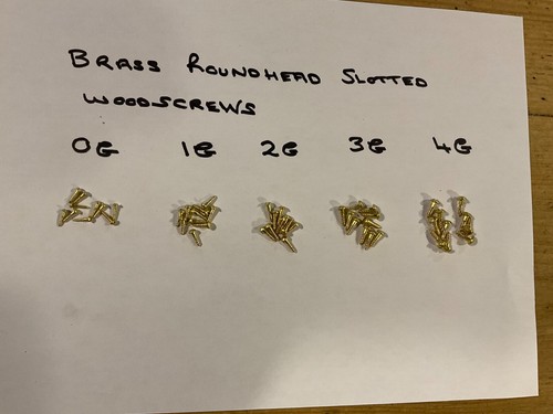 Small tiny brass - /, head