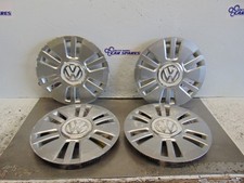 VW UP Wheel trims 11-16 set of 4 14" silver + white centre hub caps 1S0601147D
