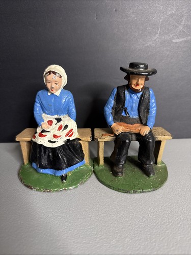 Vintage cast iron book ends - cast,