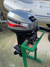 rigid inflatable boat with road trailer and 15hp engine