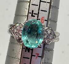 Oval cut Paraiba Tourmaline & Diamond Ring set in 18k white gold