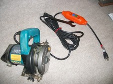 UNUSED    MAKITA 4101RH 5" TILE  MASONRY SAW   120V   7.9A