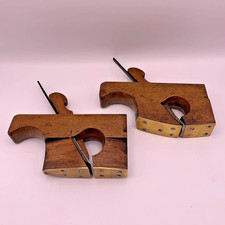 Pair Of Tailed Handle