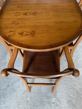 yew wood dining table and 6
