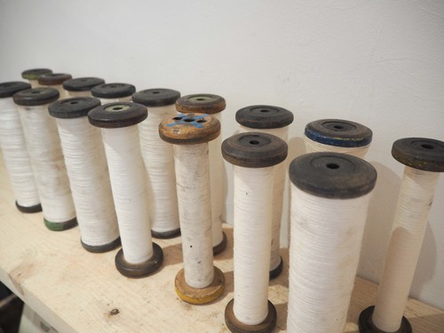 Vintage wooden factory bobbins - factory,