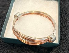 Silver, gold and copper