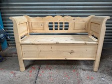 A panel and spindle backed