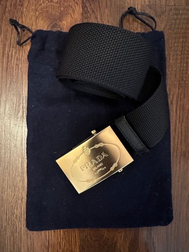 Prada gold tone logo - prada,