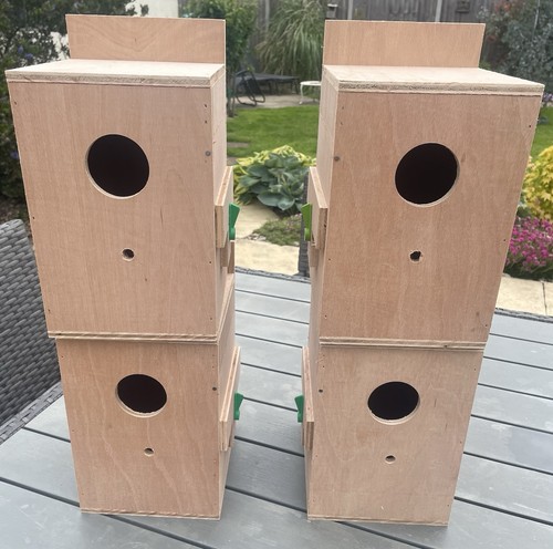 Four parakeet nestboxes - four,
