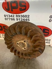 Flywheel with cooling fins