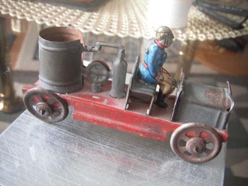 Invest vintage tinplate toy - in,