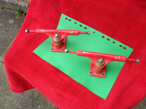 Red pair skateboard trucks - pair, of