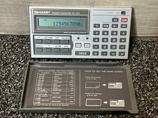 Vintage Sharp PC-1270 Pocket Computer Calculator w/ CE-212M 8K RAM CARD