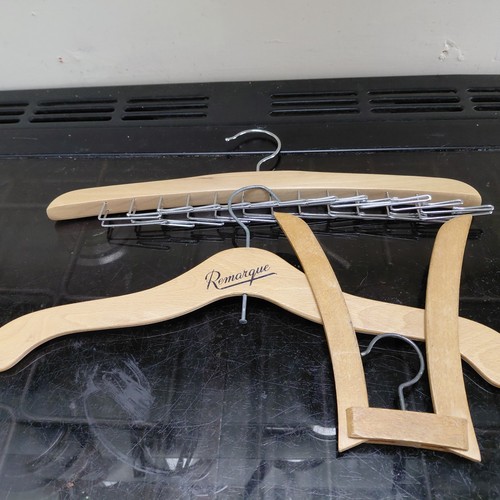 Three vintage wooden clothes