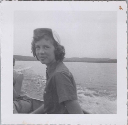 1955 woman rides speedboat - speedboat, on