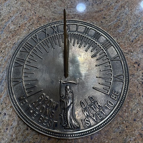 Heavy cast metal wall - wall, sundial
