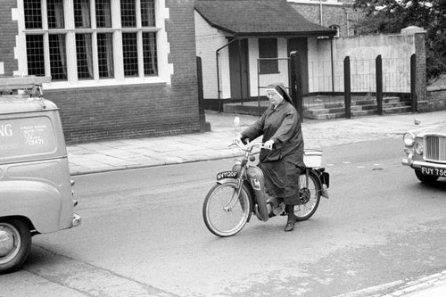 Nun driving through - driving, a