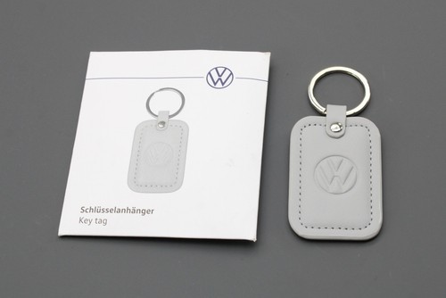 Genuine embossed logo key - embossed,