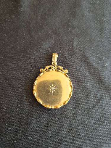 Gold round locket with - gold,